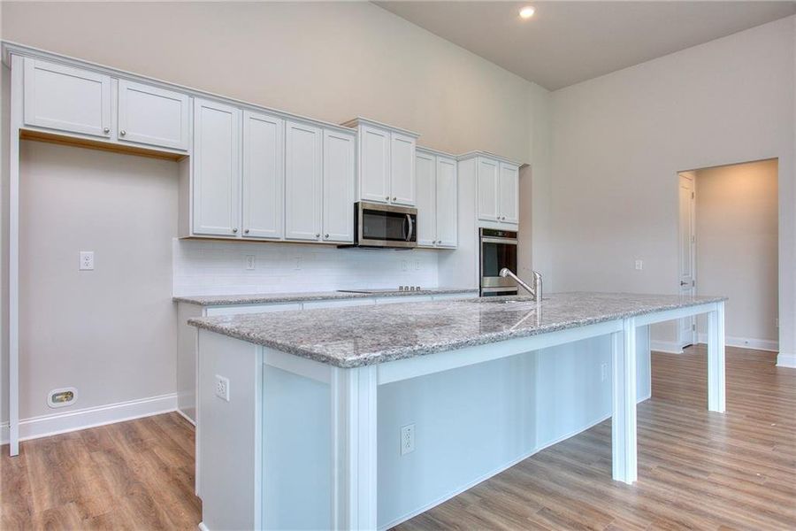 Furnished interior view inside a new home in , Homer (Image 13).