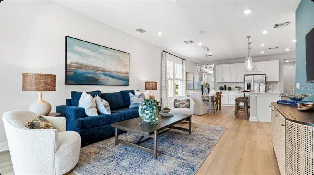 Furnished interior view inside a new home in Westview Community Group Page, Kissimmee (Image 7).
