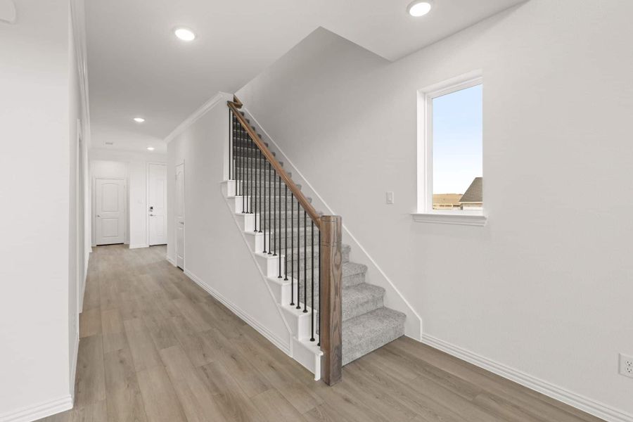 Representative unfurnished interior of a home built from the Walton by UnionMain Homes in Elevon, Lavon (Image 14). Representative unfurnished interior of a home built from the Walton by UnionMain Homes in Elevon, Lavon (Image 14).