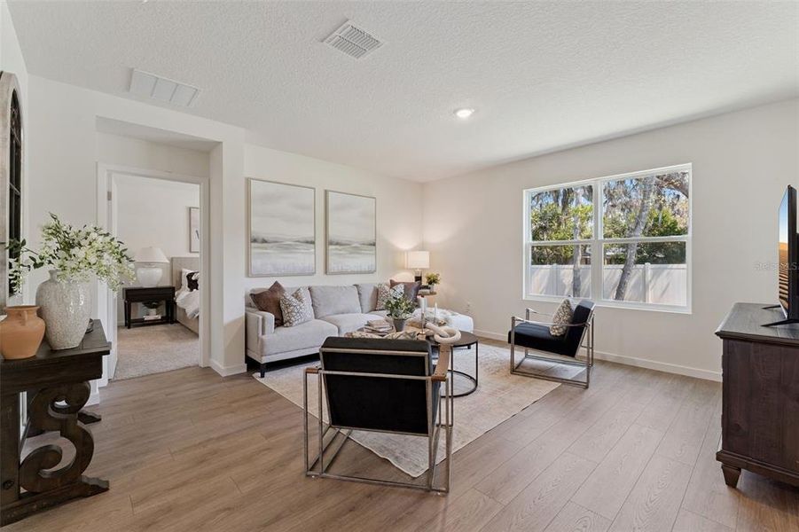 Furnished interior view inside a new home in Crossroads at Kelly Park, Apopka (Image 6).