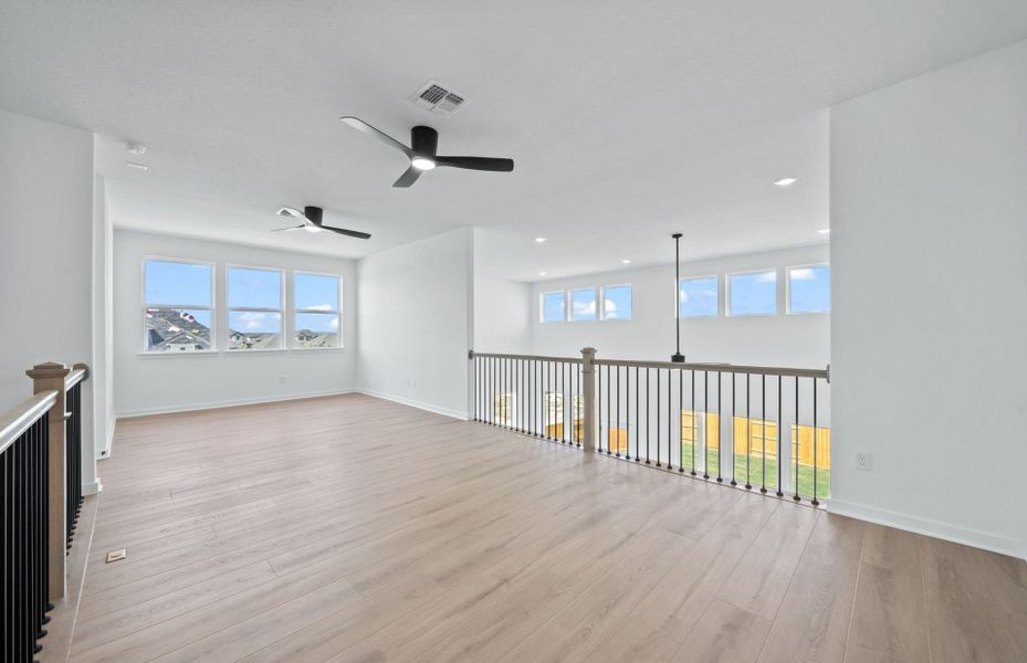 Spacious, unfurnished interior of a new home in 6 Creeks, Kyle (Image 55).