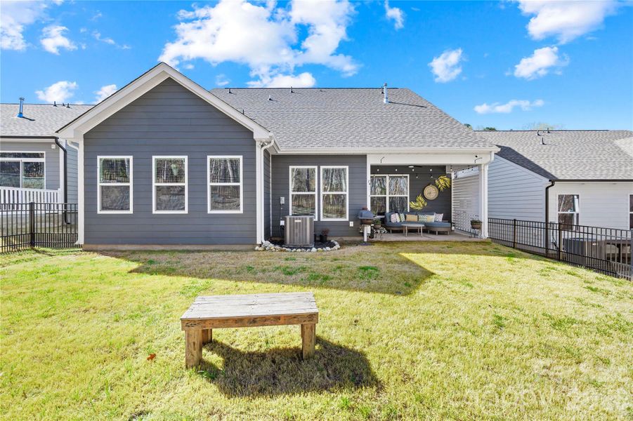 Exterior details and patio area of a home in Villas at Prestwick, Mooresville (Image 3).