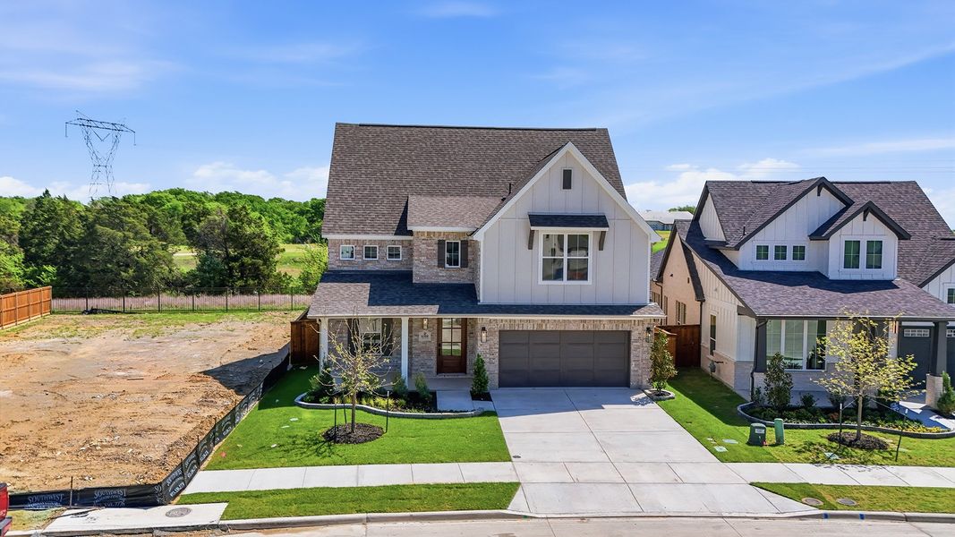 Front exterior of a new home in Aster Park, McKinney, TX, highlighting curb appeal (Image 23).