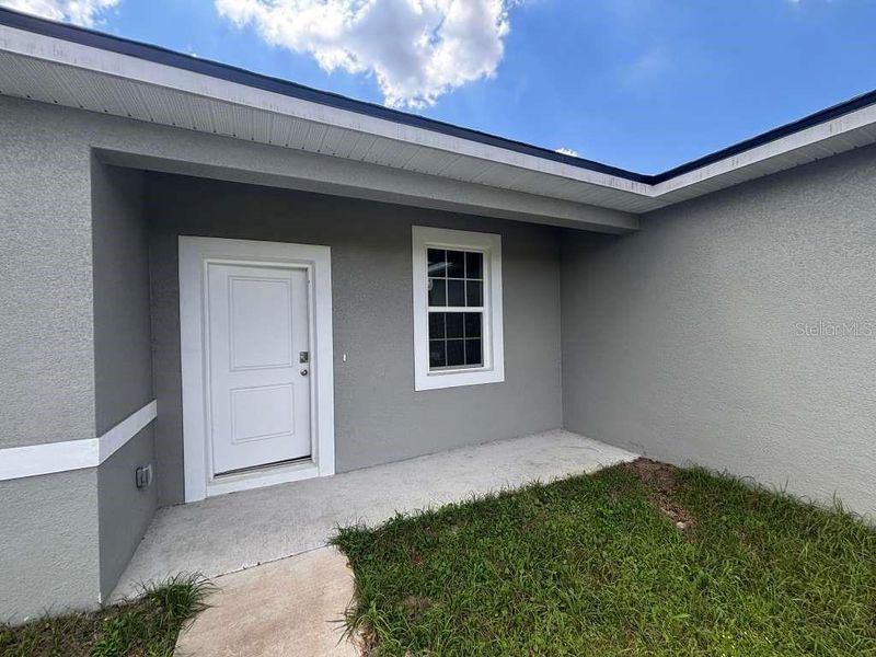 Exterior details and patio area of a home in , Citrus Springs (Image 17).
