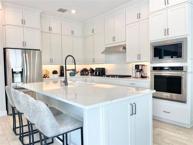 Furnished interior view inside a new home in Parkview Reserve, Orlando (Image 9).