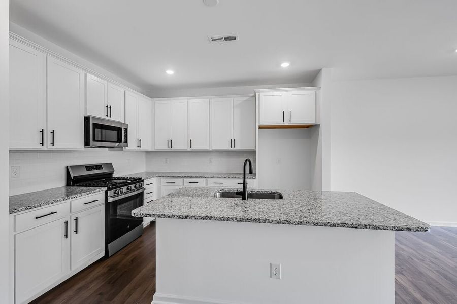 Furnished interior view inside a new home in Magnolia Townes, Wendell (Image 4).