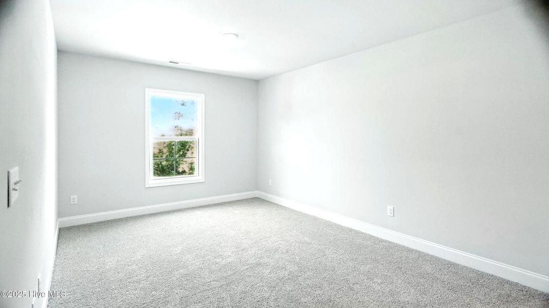 Spacious, unfurnished interior of a new home in Palmetto Creek, Bolivia (Image 10).