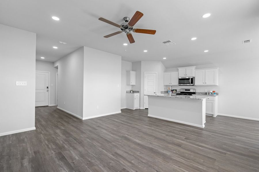 Representative furnished interior of a home built from the BELLVUE by D.R. Horton in Faculty Row, Abilene (Image 19).
