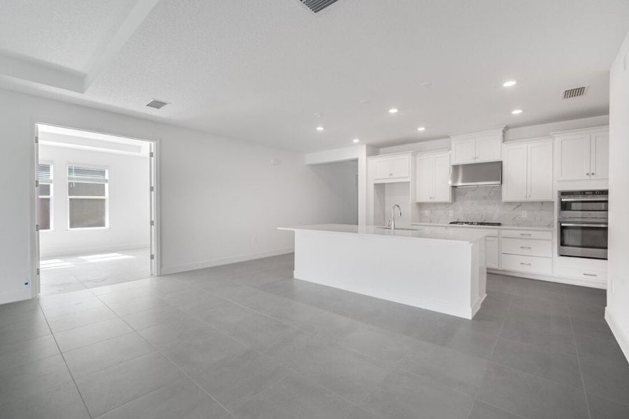 Spacious, unfurnished interior of a new home in Harvest at Ovation, Winter Garden (Image 20).