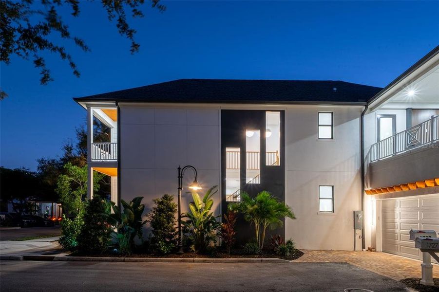 Front exterior of a new home in , Sarasota, FL, highlighting curb appeal (Image 32).