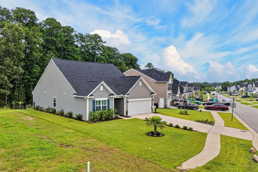 Front exterior of a new home in , Ridgeville, SC, highlighting curb appeal (Image 26).