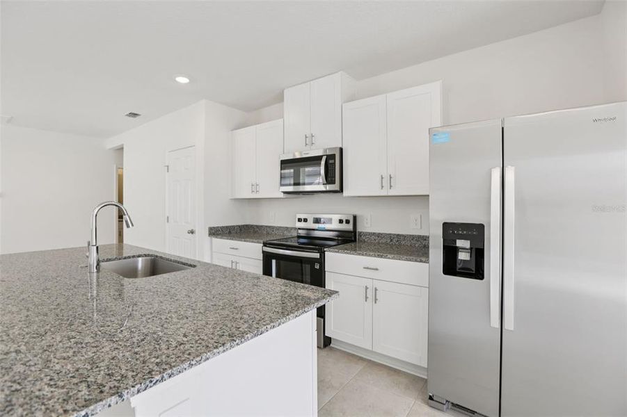 Furnished interior view inside a new home in Springs at Lake Alfred - Classic Series, Lake Alfred (Image 14).