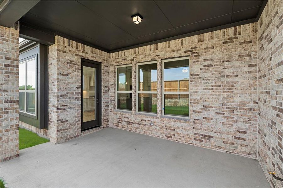 Exterior details and patio area of a home in River Ranch, Van Alstyne (Image 21). Exterior details and patio area of a home in River Ranch, Van Alstyne (Image 21).