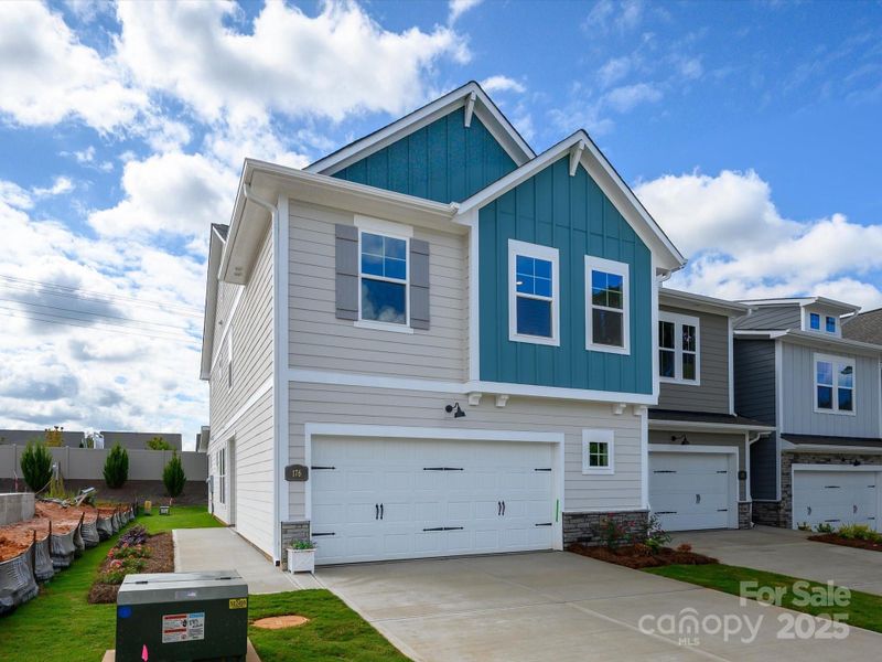 Front exterior of a new home in Westview Towns, Waxhaw, NC, highlighting curb appeal (Image 18).