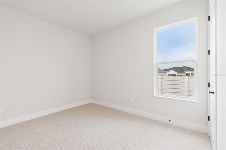 Spacious, unfurnished interior of a new home in Gracewater at Sarasota, Sarasota (Image 33).