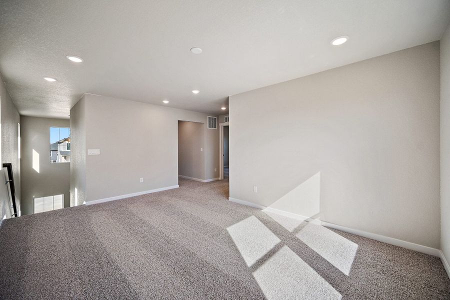 Spacious, unfurnished interior of a new home in Ridge at Lorson Ranch, Colorado Springs (Image 20).