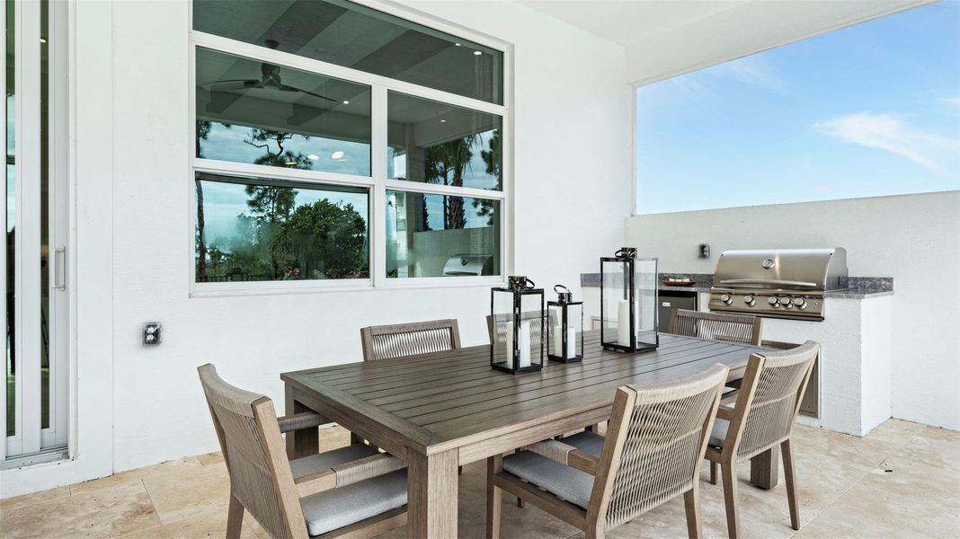 Exterior details and patio area of a home in L'Ambiance at Avenir, Palm Beach Gardens (Image 28).