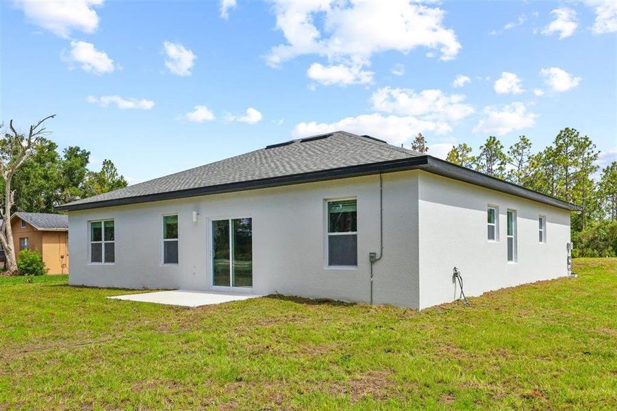 Exterior details and patio area of a home in , Indian Lake Estates (Image 26).
