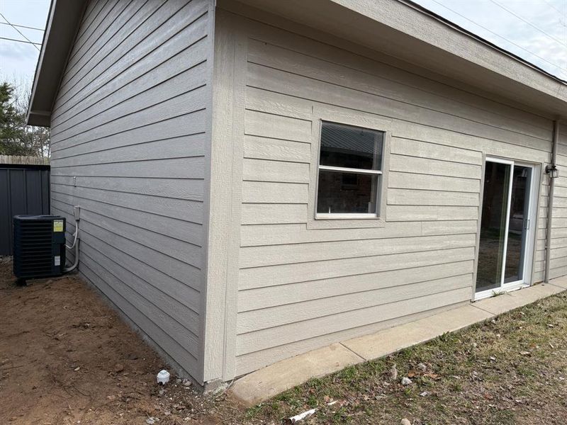 Exterior details and patio area of a home in , Joshua (Image 29).