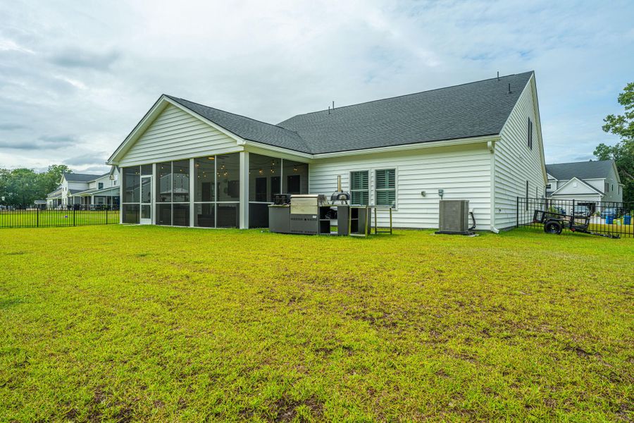 Front exterior of a new home in Saint John's Lake: Coastal Collection, Johns Island, SC, highlighting curb appeal (Image 24).