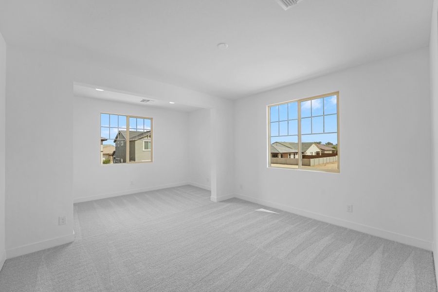 Spacious, unfurnished interior of a new home in Ellsworth Ranch Voyage Collection, Queen Creek (Image 18).