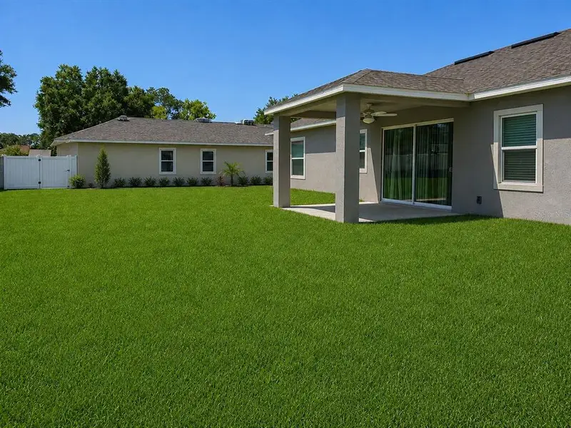 Exterior details and patio area of a home in , Palm Coast (Image 3). Exterior details and patio area of a home in , Palm Coast (Image 3).