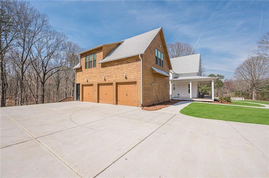 Front exterior of a new home in , Waleska, GA, highlighting curb appeal (Image 23).