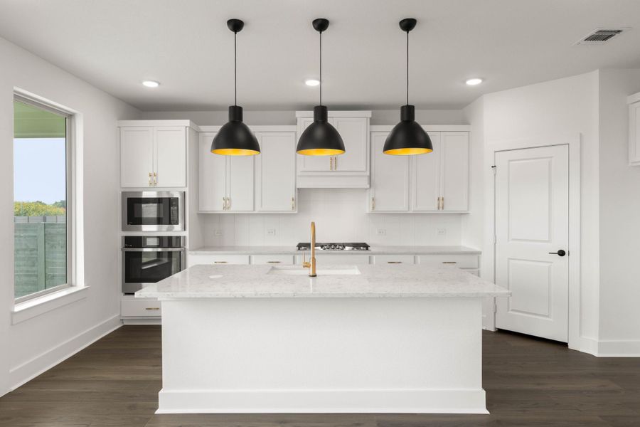 Furnished interior view inside a new home in Cottage Collection at Harvest, Argyle (Image 5).