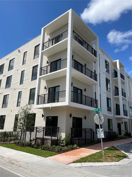Front exterior of a new home in , Doral, FL, highlighting curb appeal (Image 16).