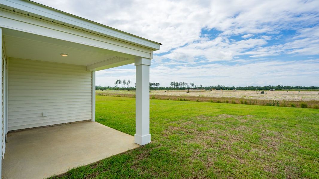 Exterior details and patio area of a home in Cottonwood Place, Tabor City (Image 19). Exterior details and patio area of a home in Cottonwood Place, Tabor City (Image 19).
