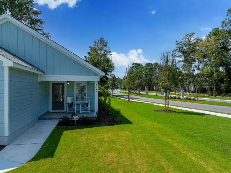 Front exterior of a new home in Osprey Landing, Southport, NC, highlighting curb appeal (Image 27).