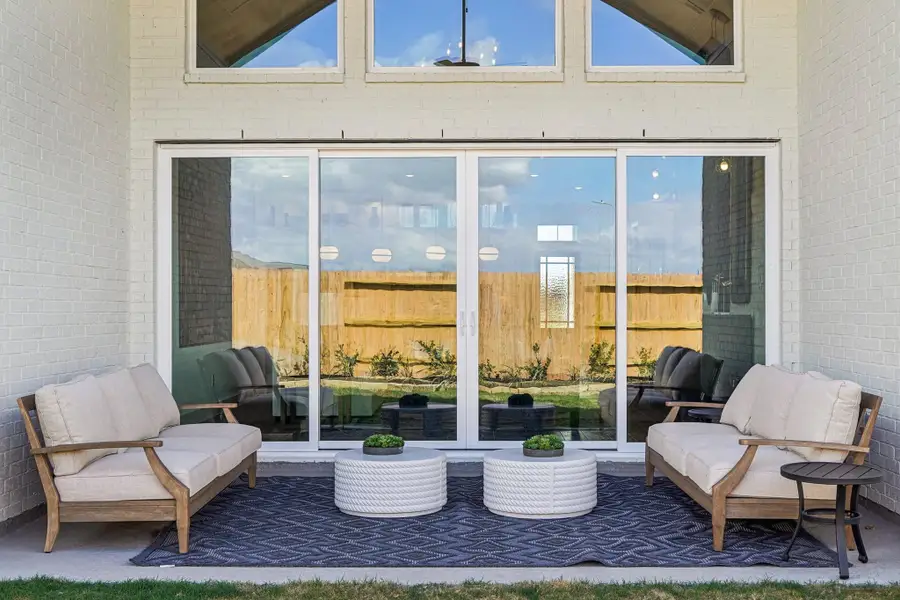 Exterior details and patio area of a home in Wildrye, Waller (Image 3).