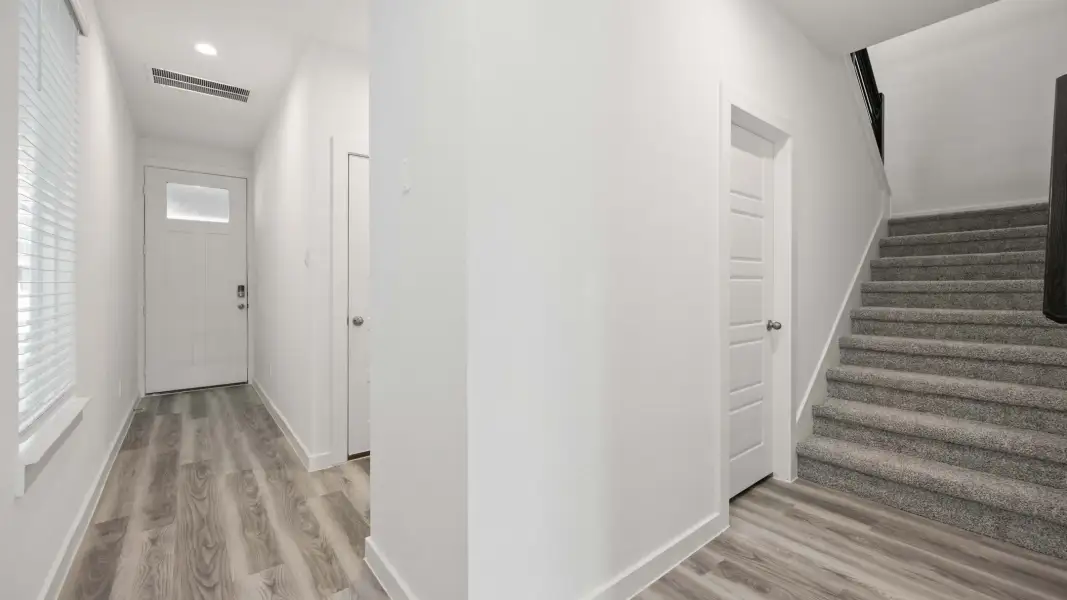 Representative unfurnished interior of a home built from the Cade by D.R. Horton in Alexander Townhomes, Pearland (Image 18). Representative unfurnished interior of a home built from the Cade by D.R. Horton in Alexander Townhomes, Pearland (Image 18).