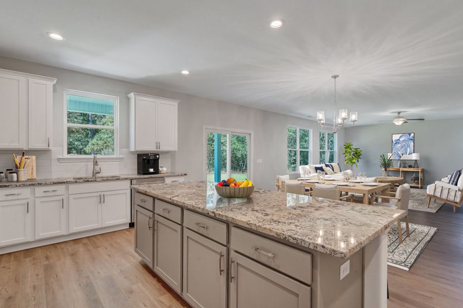 Representative furnished interior of a home built from the The Stonecrest by Smith Family Homes in Ramsey Landing, Rincon (Image 7).