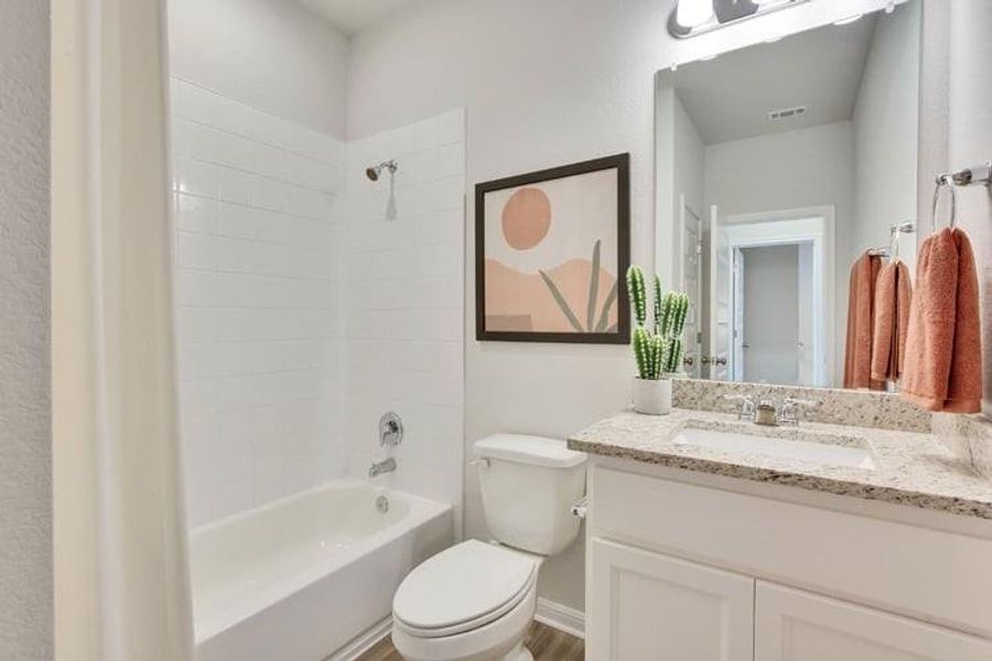 Furnished interior view inside a new home in Stallion Run, Buda (Image 10).