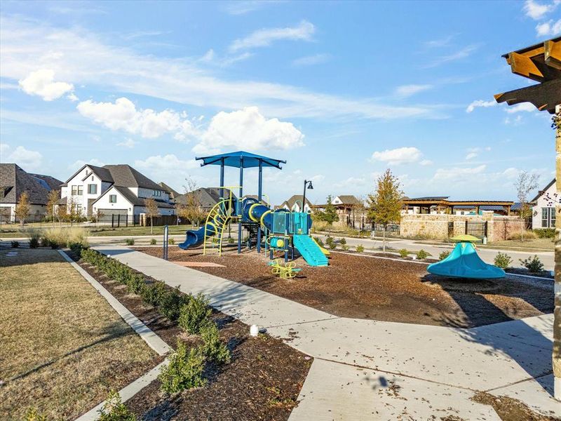Community jungle gym with a residential view Community jungle gym with a residential view