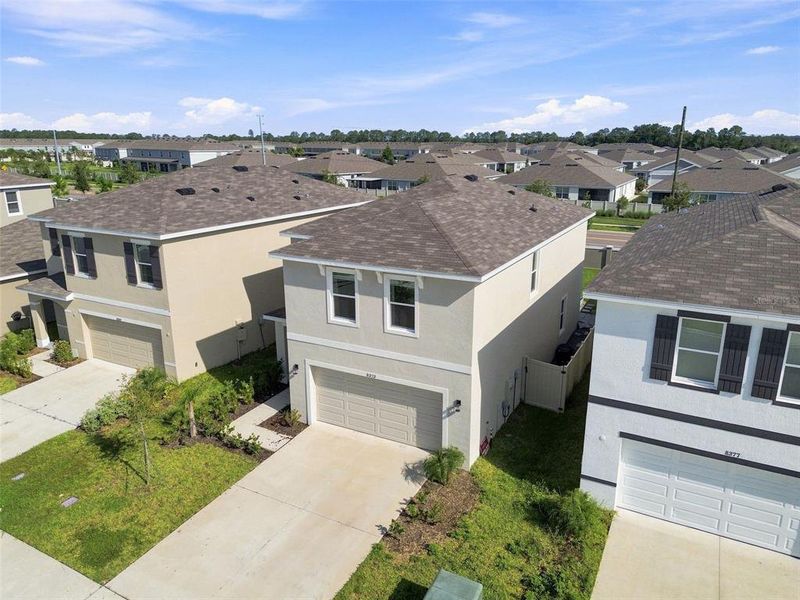 Front exterior of a new home in , Wesley Chapel, FL, highlighting curb appeal (Image 21).