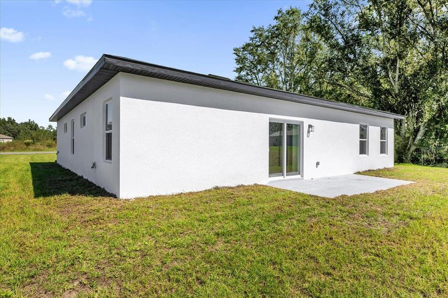 Exterior details and patio area of a home in , Ocala (Image 3).