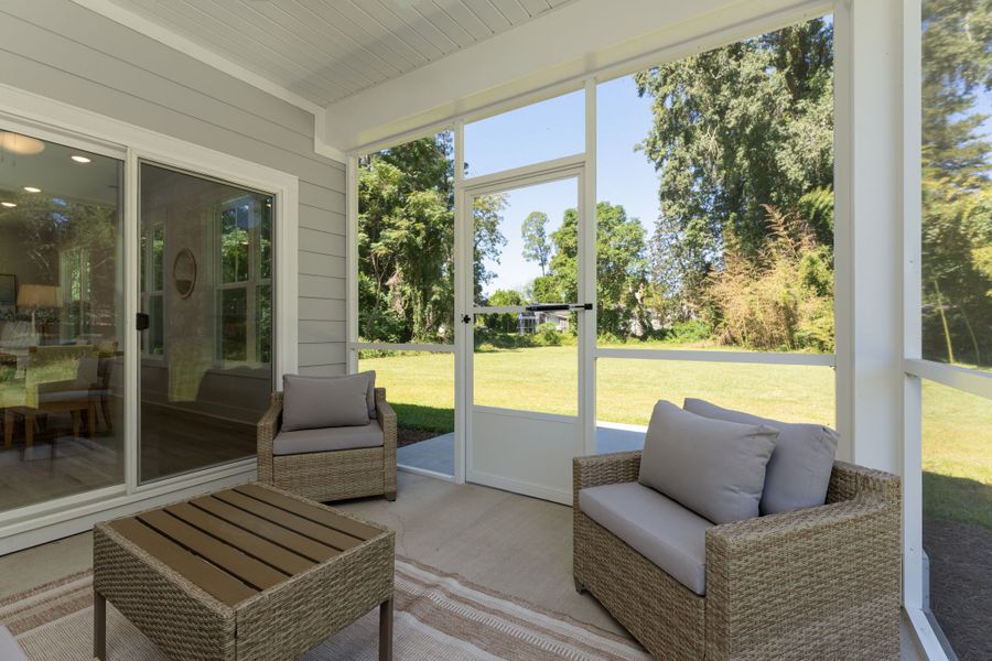 Exterior details and patio area of a home in The Bluffs at Lake Waccamaw, Lake Waccamaw (Image 29).
