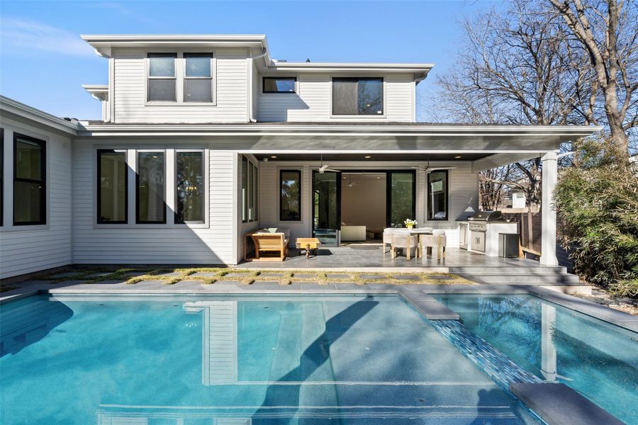 Open up the Fleetwood sliding glass back doors and a private backyard retreat awaits. Established landscaping and a bamboo hedge offer great privacy from neighbors.
