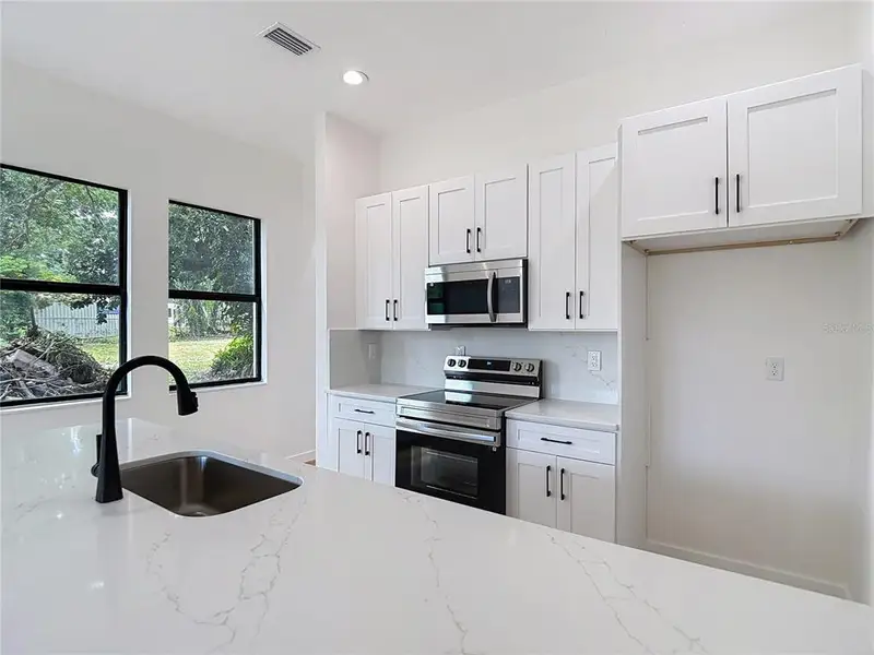 Furnished interior view inside a new home in , Tampa (Image 10).