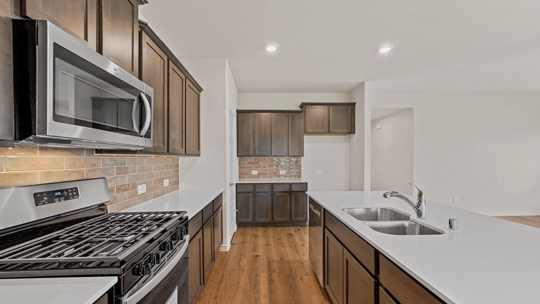 Furnished interior view inside a new home in Fireside by the Lake, Garland (Image 5).