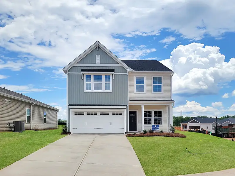 Front exterior of a new home in Mayfair Village, Spartanburg, SC, highlighting curb appeal (Image 1). Front exterior of a new home in Mayfair Village, Spartanburg, SC, highlighting curb appeal (Image 1).