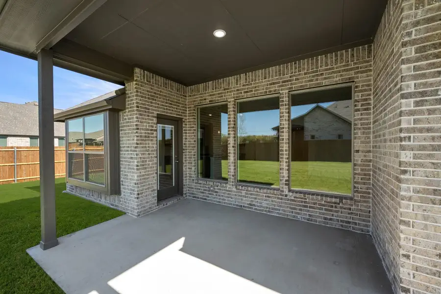 Exterior details and patio area of a home in Summer Crest, Fort Worth (Image 3). Exterior details and patio area of a home in Summer Crest, Fort Worth (Image 3).