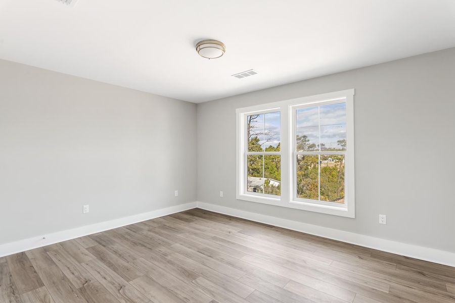 Representative unfurnished interior of a home built from the Pearl by Brock Built in Nautilus Pointe, Inlet Beach (Image 33).