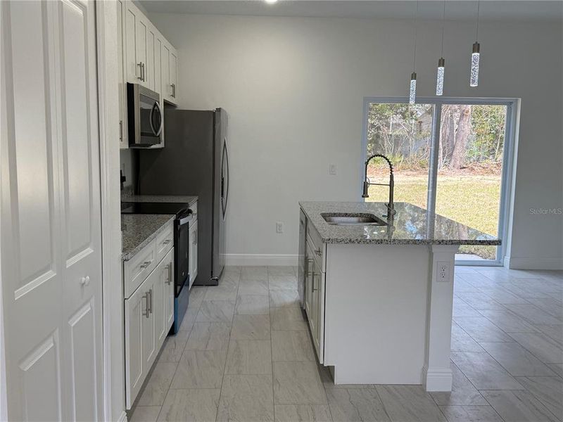 Furnished interior view inside a new home in , Citrus Springs (Image 6).