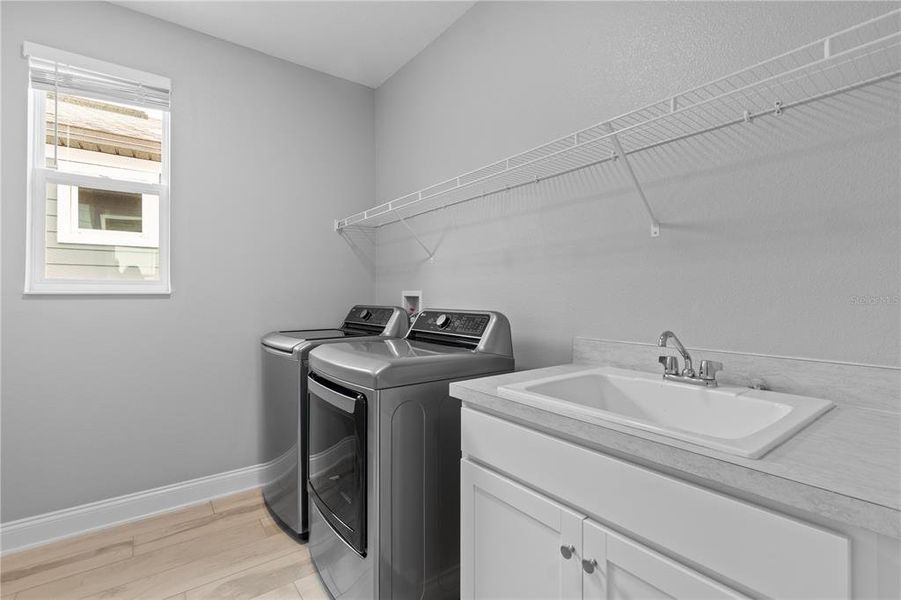Furnished interior view inside a new home in Encore at Ovation, Winter Garden (Image 7).