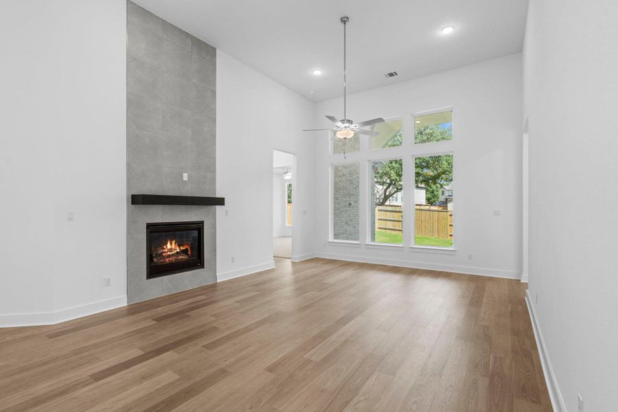 Family Room with soaring ceiling & fireplace Family Room with soaring ceiling & fireplace