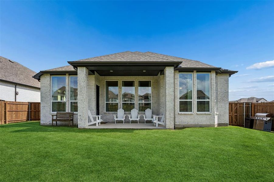 Exterior details and patio area of a home in Devonshire, Forney (Image 3).