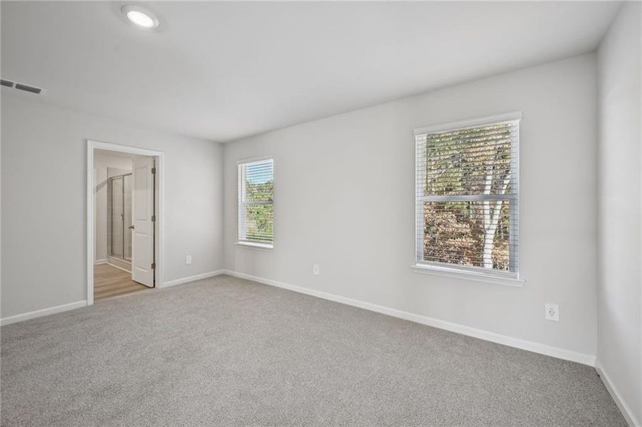 Spacious, unfurnished interior of a new home in Creekside at Oxford Park, Fairburn (Image 36).
